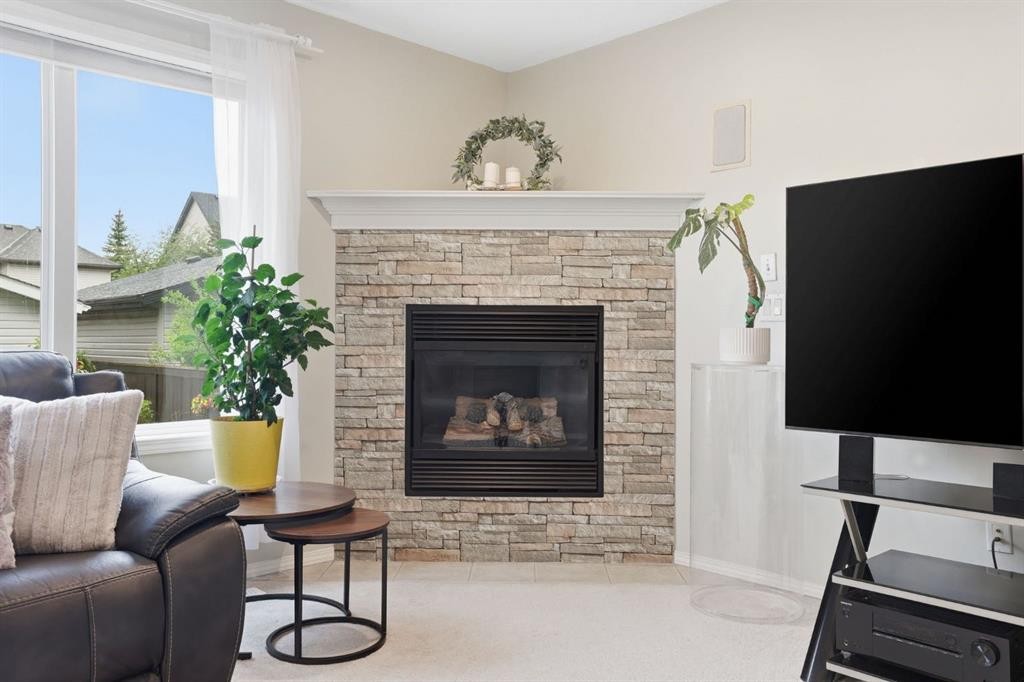 450 Elgin Way Se, Calgary, AB - Indoor With Fireplace