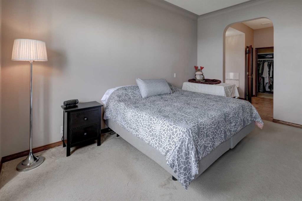 321 Gleneagles View, Cochrane, AB - Indoor Photo Showing Bedroom
