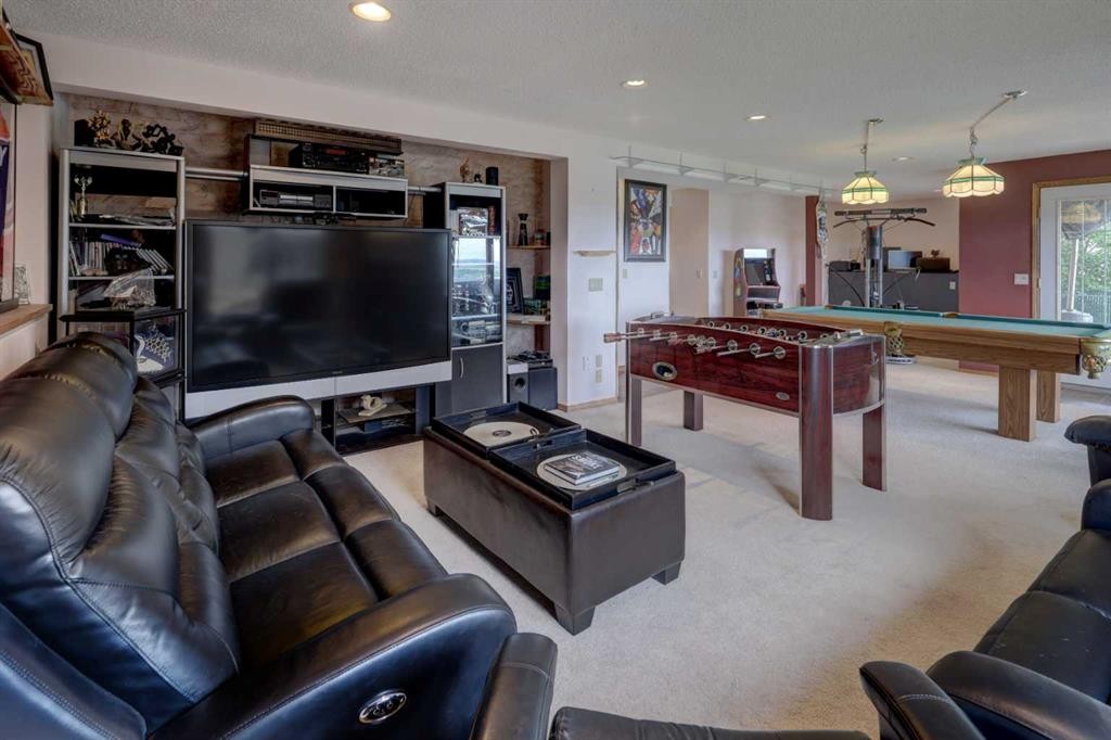 321 Gleneagles View, Cochrane, AB - Indoor Photo Showing Other Room