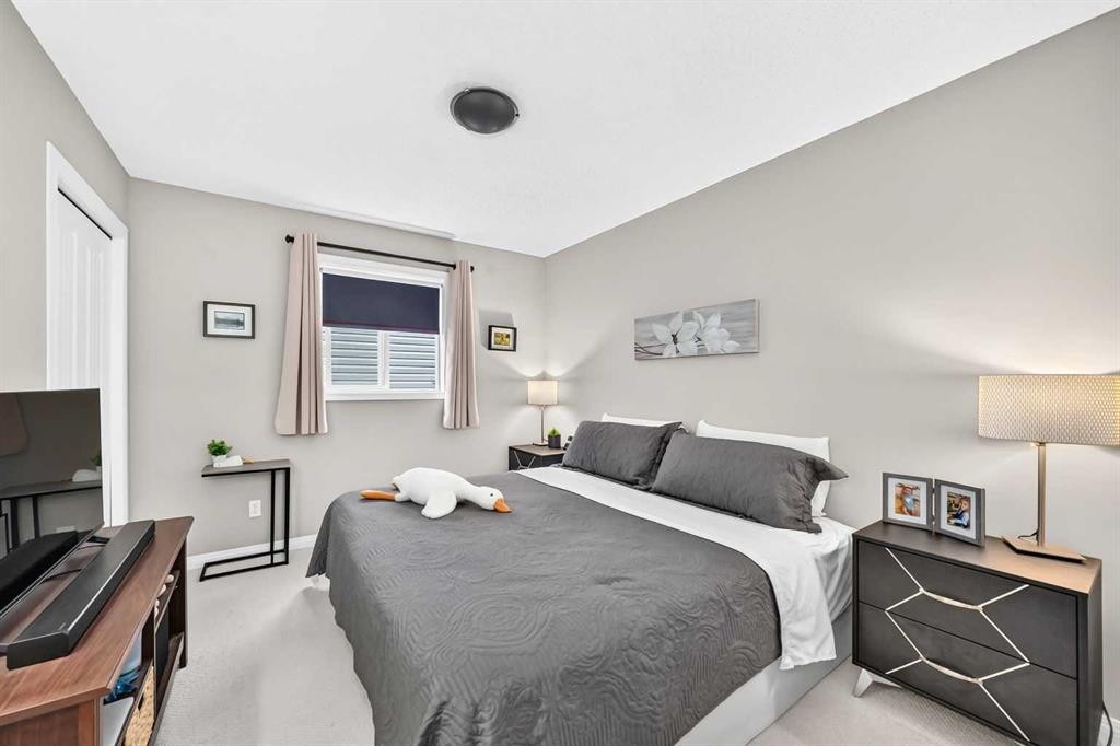 121 Chapalina Heights Se, Calgary, AB - Indoor Photo Showing Bedroom