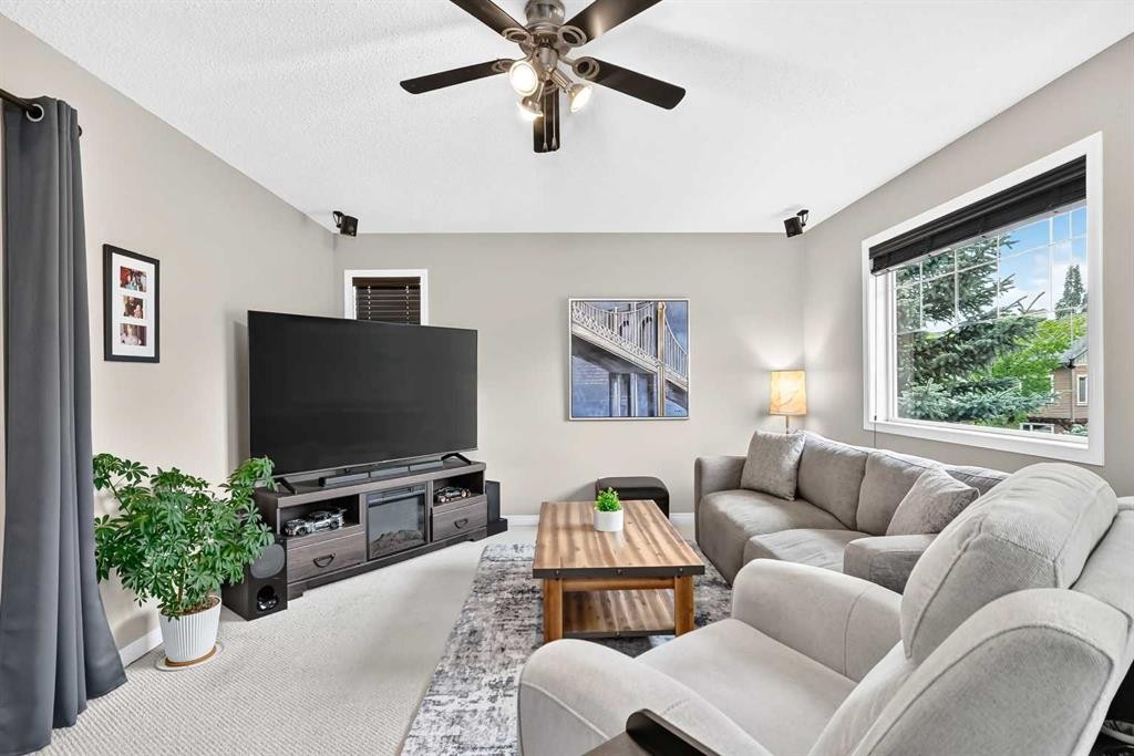 121 Chapalina Heights Se, Calgary, AB - Indoor Photo Showing Living Room