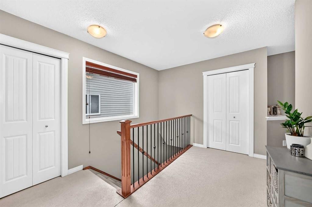 121 Chapalina Heights Se, Calgary, AB - Indoor Photo Showing Other Room
