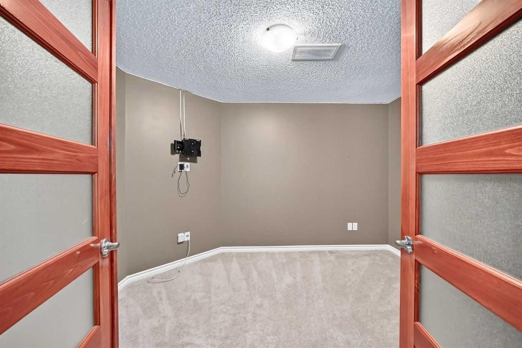 121 Chapalina Heights Se, Calgary, AB - Indoor Photo Showing Other Room