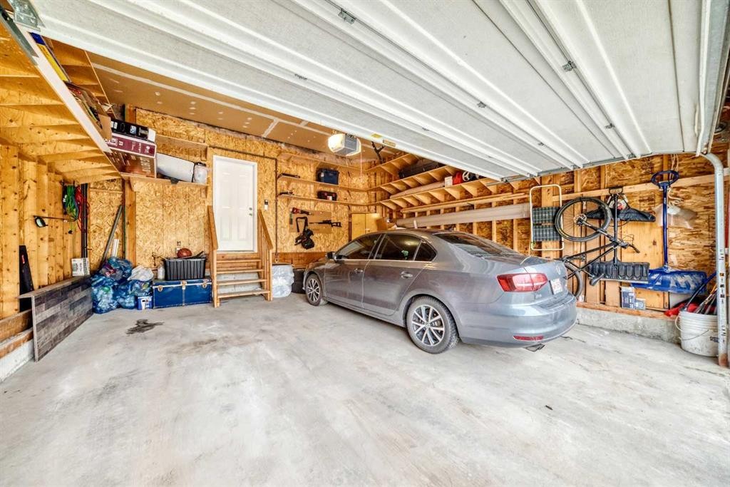 121 Chapalina Heights Se, Calgary, AB - Indoor Photo Showing Garage