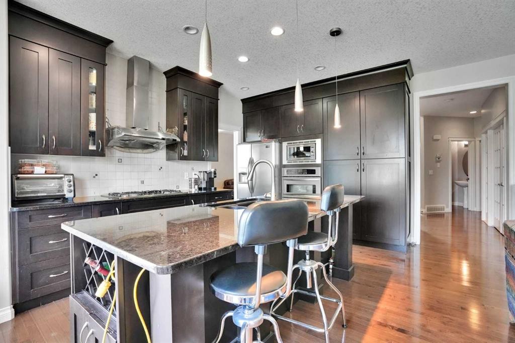 126 Panatella Crescent Nw, Calgary, AB - Indoor Photo Showing Kitchen With Upgraded Kitchen