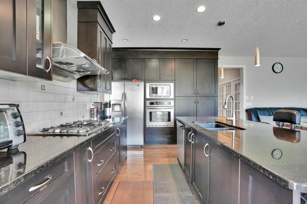 126 Panatella Crescent Nw, Calgary, AB - Indoor Photo Showing Kitchen With Double Sink With Upgraded Kitchen