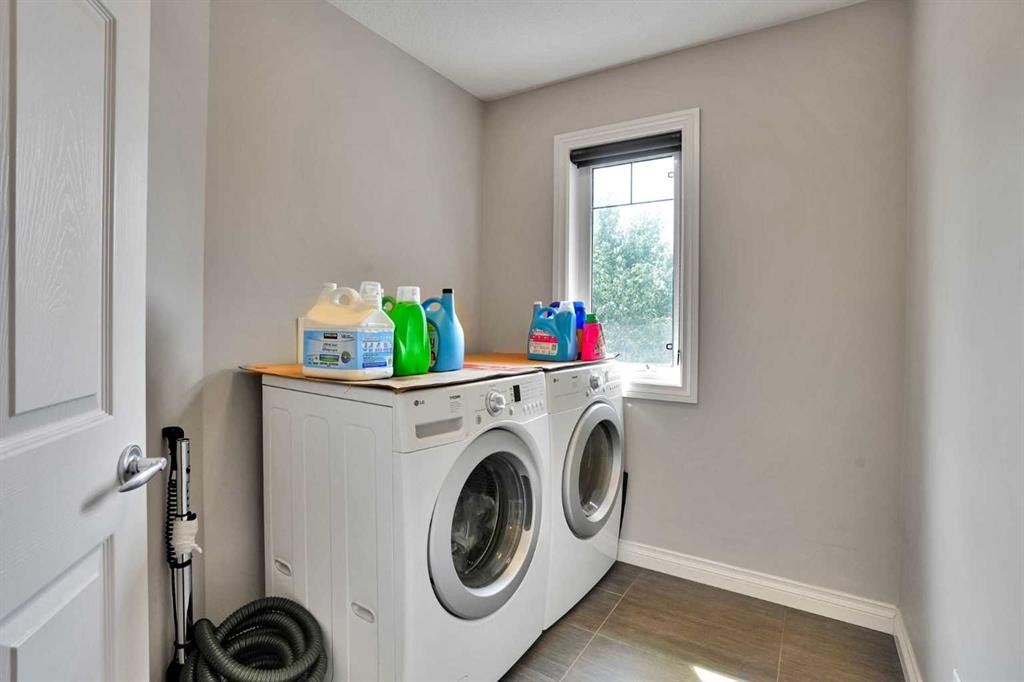126 Panatella Crescent Nw, Calgary, AB - Indoor Photo Showing Laundry Room