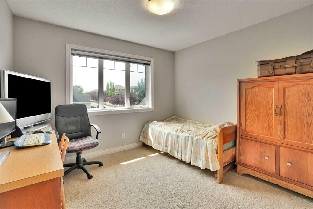 126 Panatella Crescent Nw, Calgary, AB - Indoor Photo Showing Bedroom