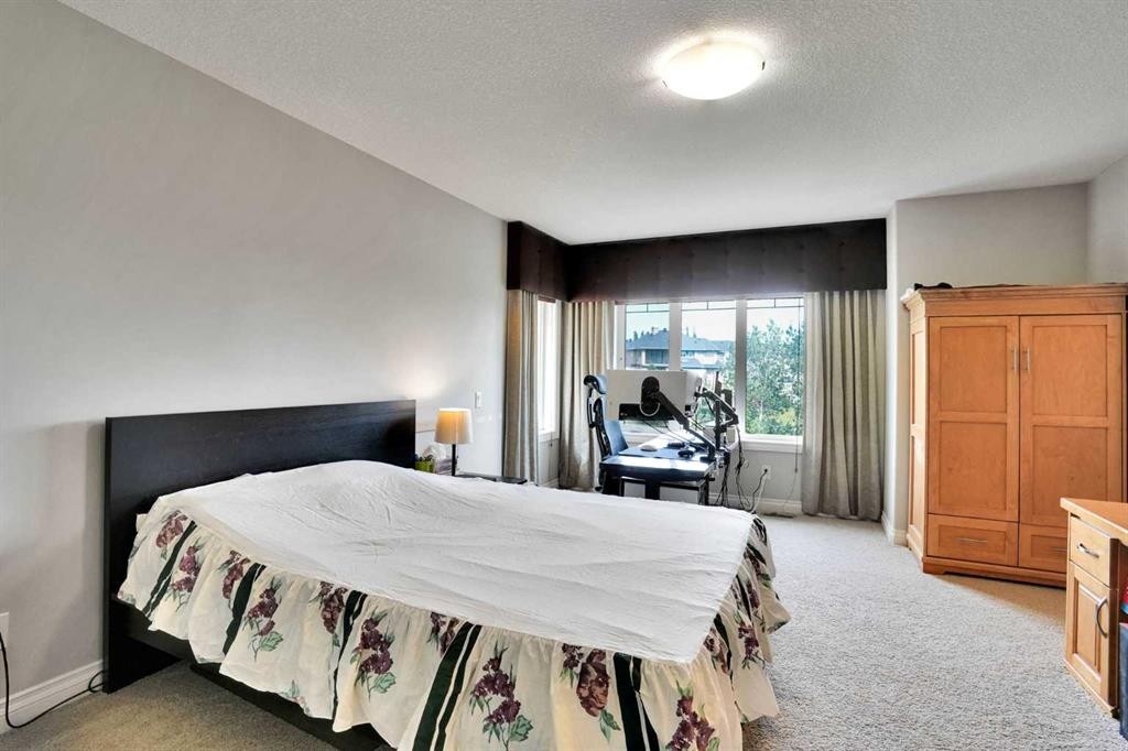 126 Panatella Crescent Nw, Calgary, AB - Indoor Photo Showing Bedroom