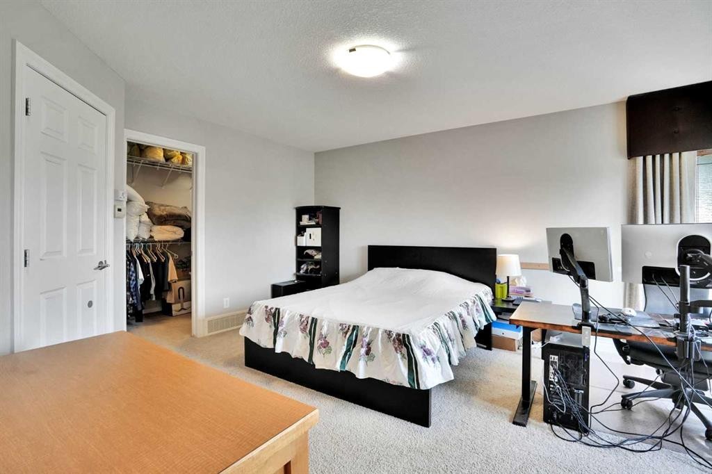 126 Panatella Crescent Nw, Calgary, AB - Indoor Photo Showing Bedroom