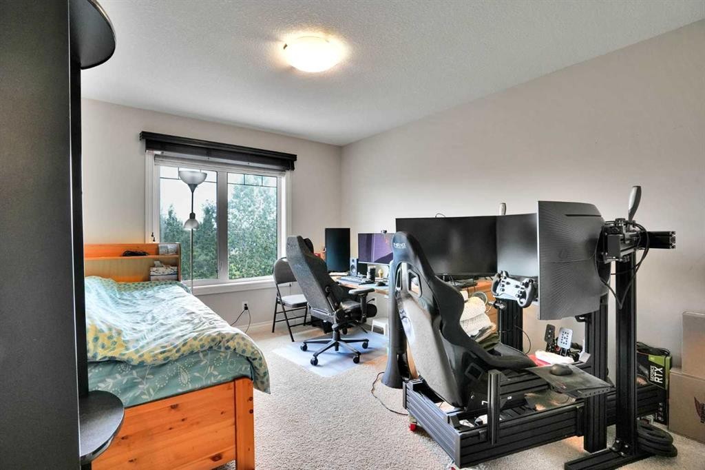 126 Panatella Crescent Nw, Calgary, AB - Indoor Photo Showing Gym Room