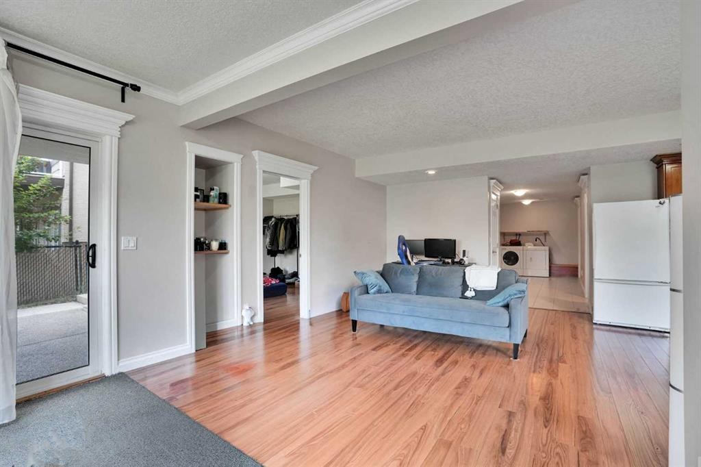 126 Panatella Crescent Nw, Calgary, AB - Indoor Photo Showing Living Room