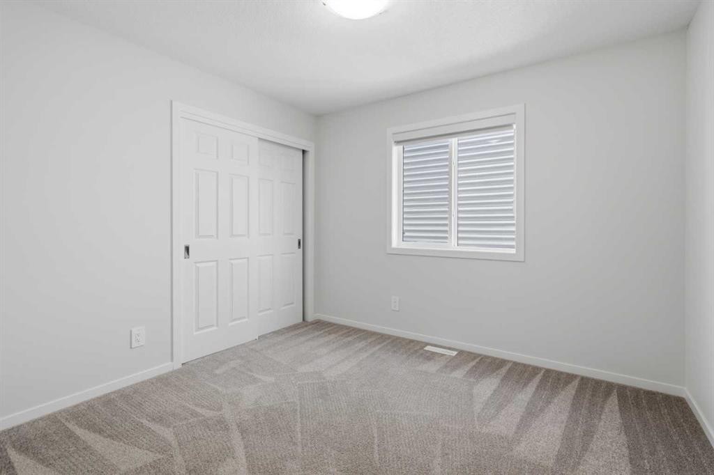 199 Carringham Road Nw, Calgary, AB - Indoor Photo Showing Other Room