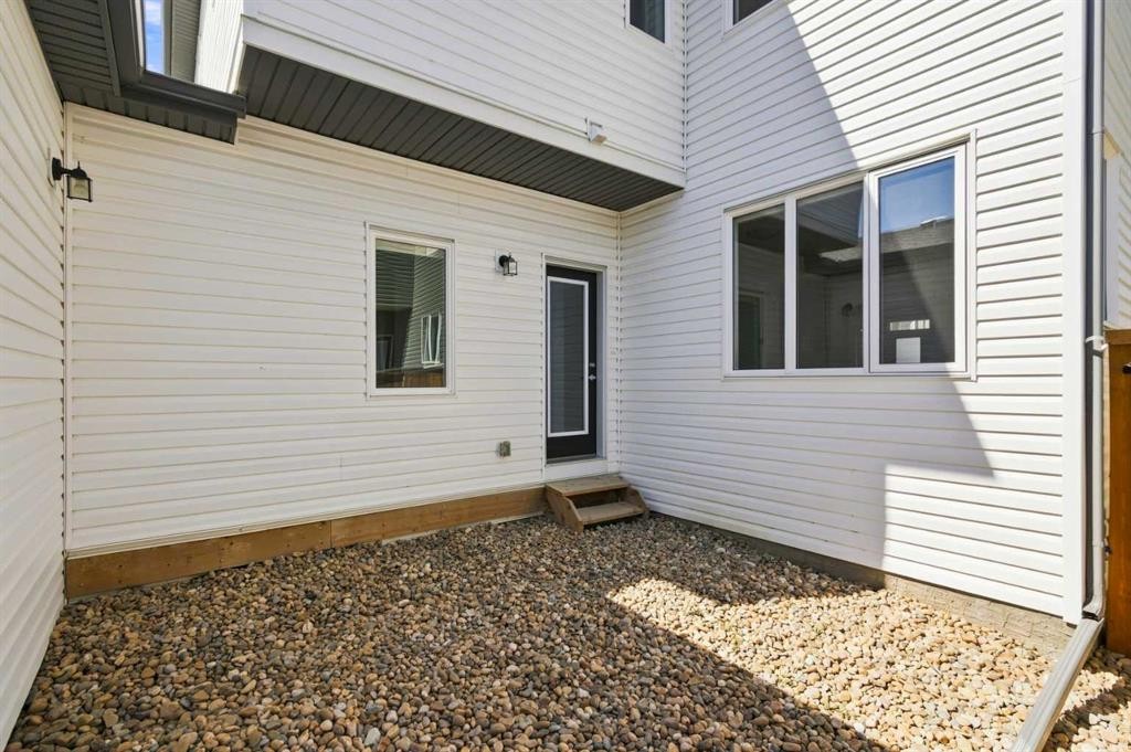 199 Carringham Road Nw, Calgary, AB - Outdoor With Exterior
