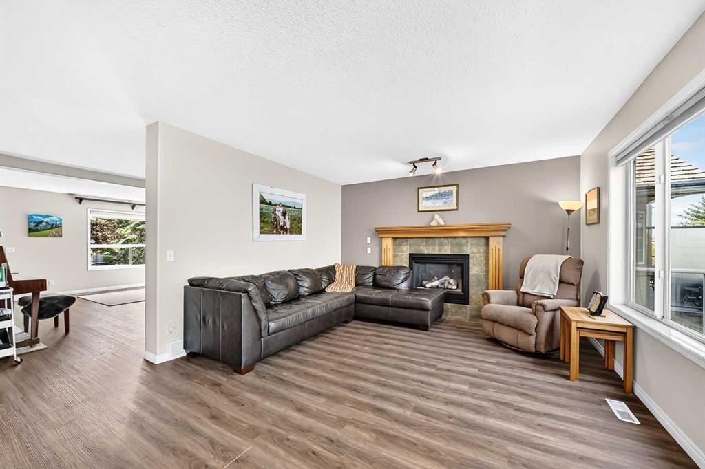 60 Harvest Park Way, Calgary, AB - Indoor Photo Showing Living Room With Fireplace