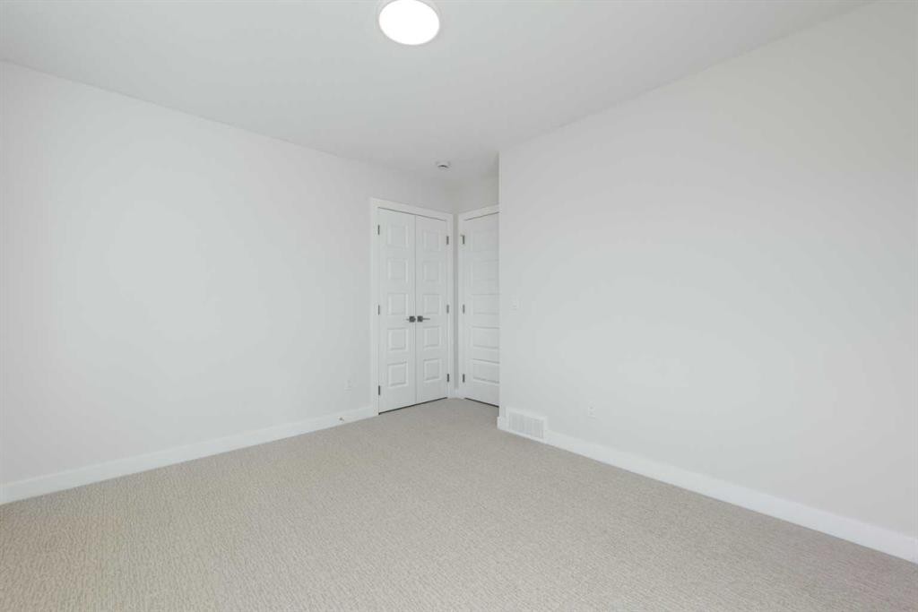 126 Sandpiper Bend, Chestermere, AB - Indoor Photo Showing Other Room
