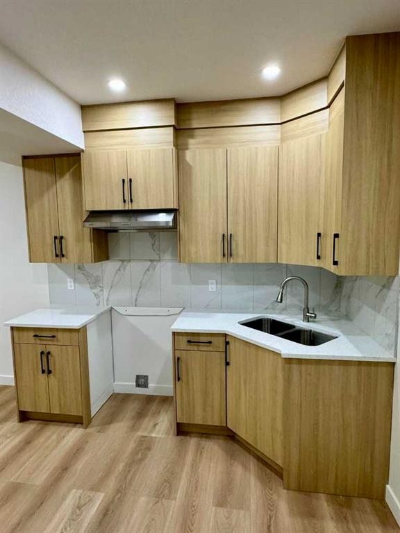 126 Sandpiper Bend, Chestermere, AB - Indoor Photo Showing Kitchen With Double Sink
