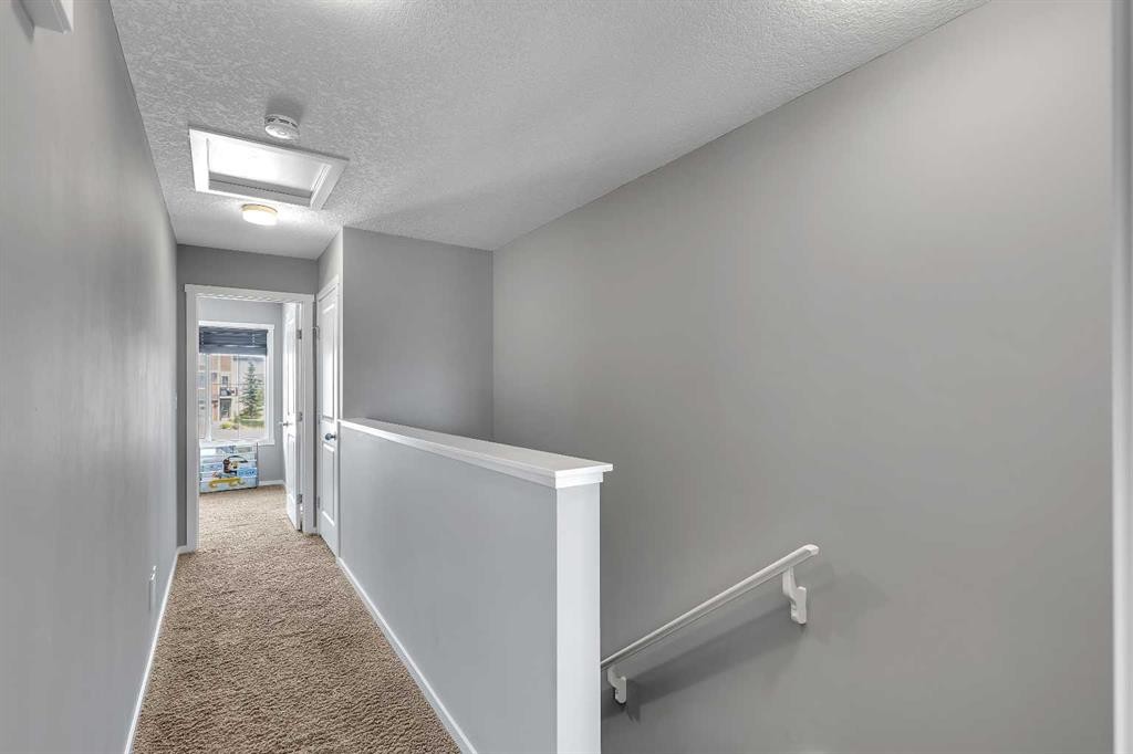 79 Evansview Gardens Nw, Calgary, AB - Indoor Photo Showing Other Room