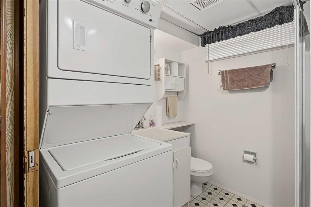 3414 Morley Trail Nw, Calgary, AB - Indoor Photo Showing Laundry Room