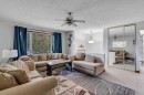 104 Falsby Way Ne, Calgary, AB  - Indoor Photo Showing Living Room 
