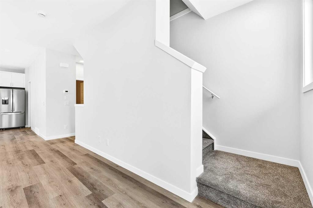 302-40 Creekside Way Sw, Calgary, AB - Indoor Photo Showing Other Room