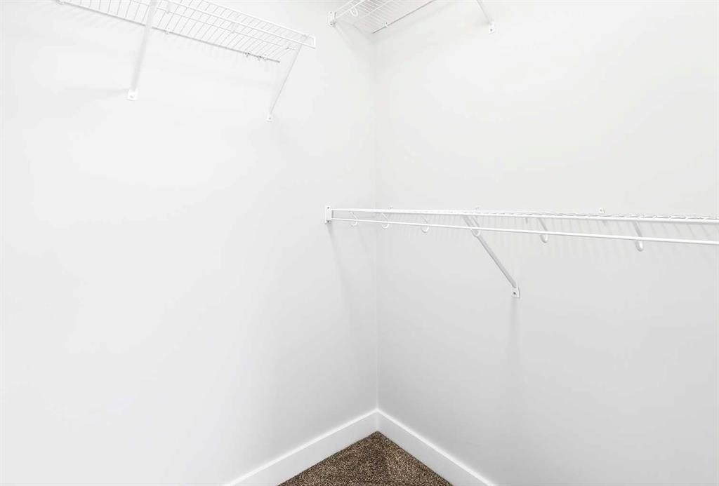302-40 Creekside Way Sw, Calgary, AB - Indoor With Storage