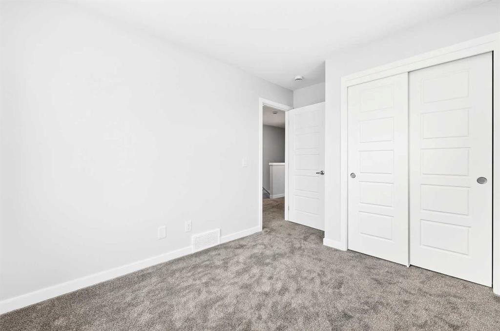 302-40 Creekside Way Sw, Calgary, AB - Indoor Photo Showing Other Room