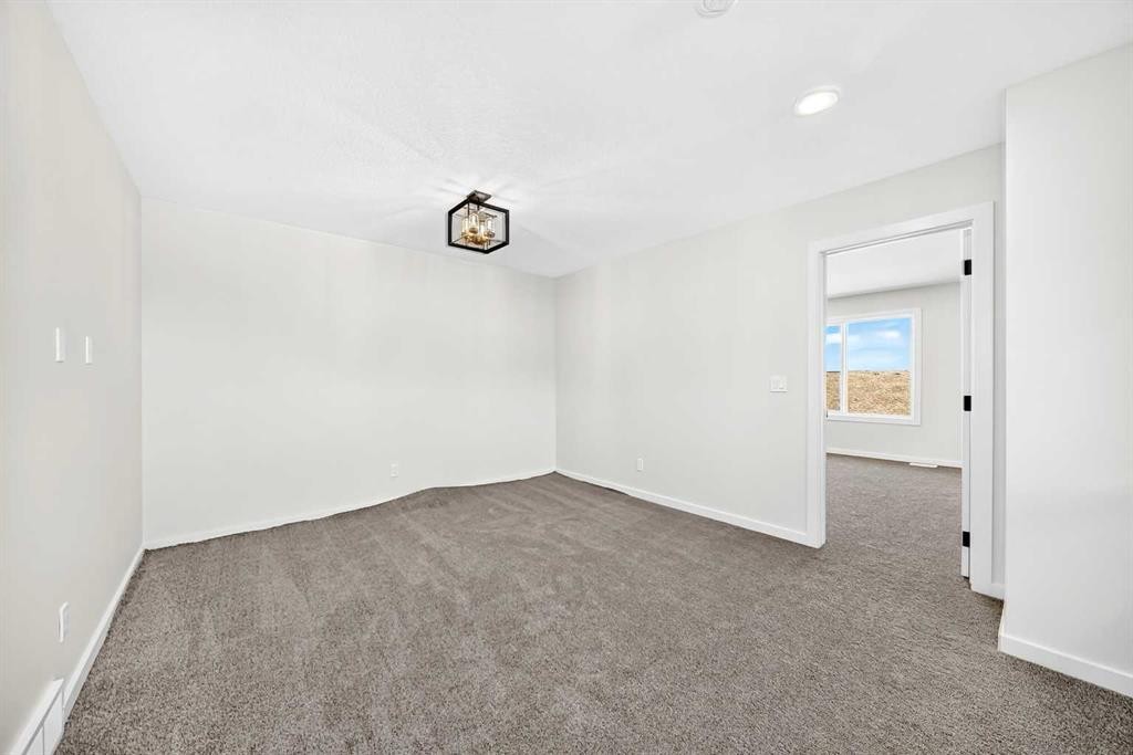 135 Mallard Heath Se, Calgary, AB - Indoor Photo Showing Other Room