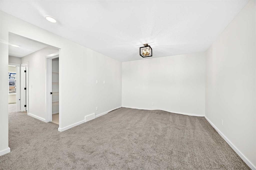 135 Mallard Heath Se, Calgary, AB - Indoor Photo Showing Other Room