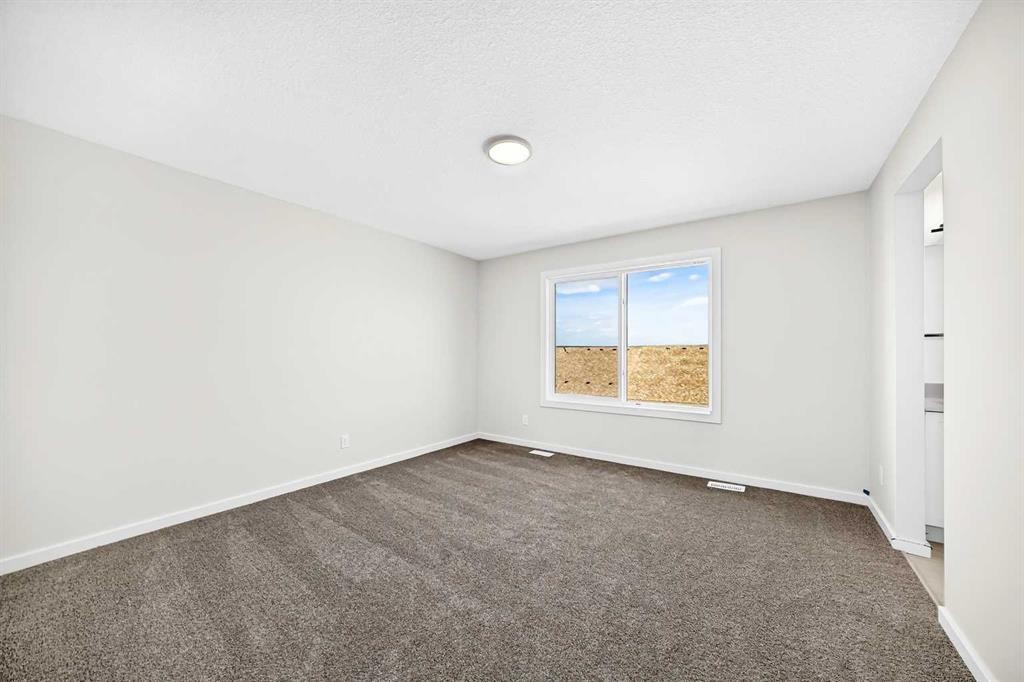 135 Mallard Heath Se, Calgary, AB - Indoor Photo Showing Other Room