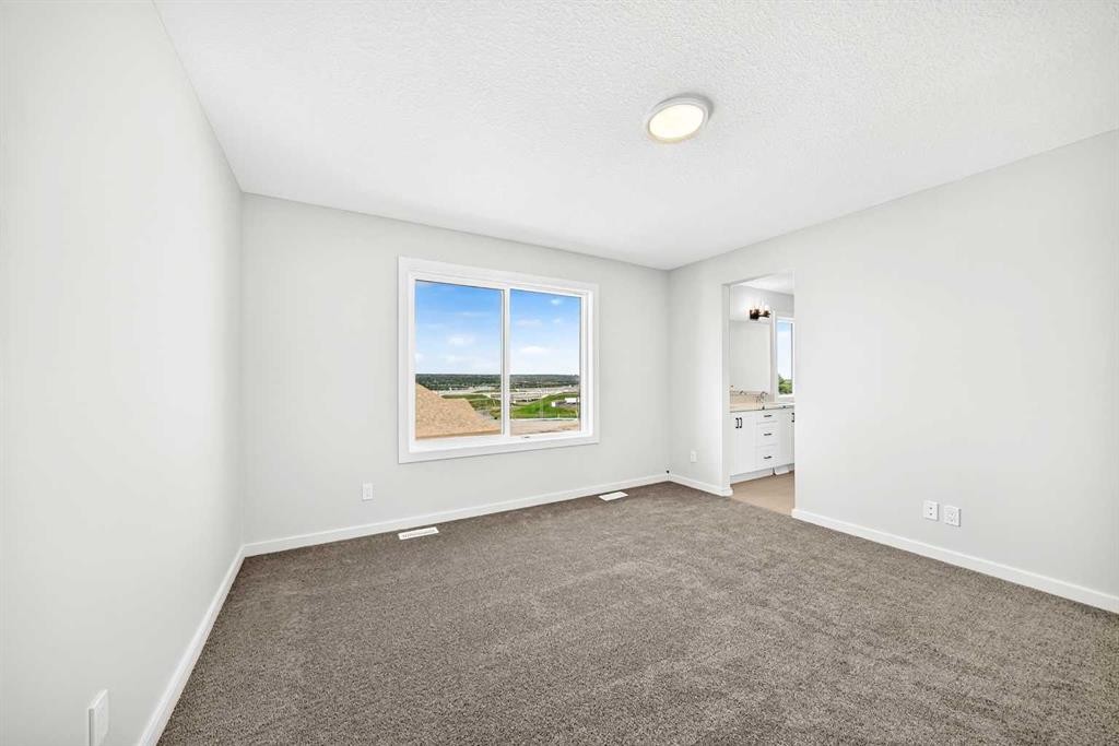 135 Mallard Heath Se, Calgary, AB - Indoor Photo Showing Other Room