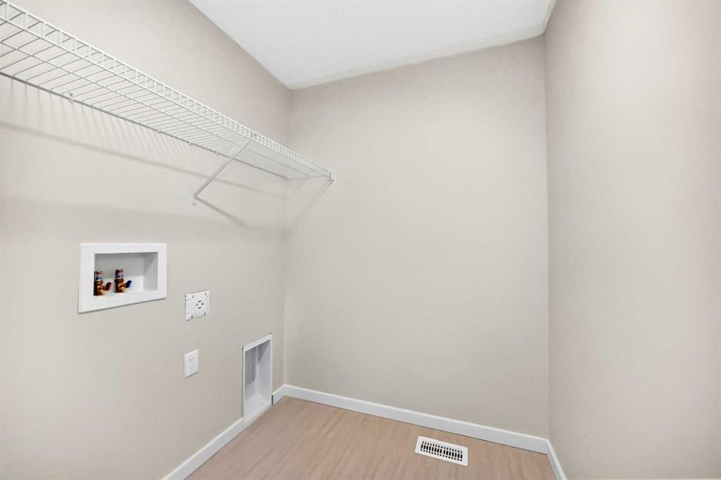 135 Mallard Heath Se, Calgary, AB - Indoor With Storage