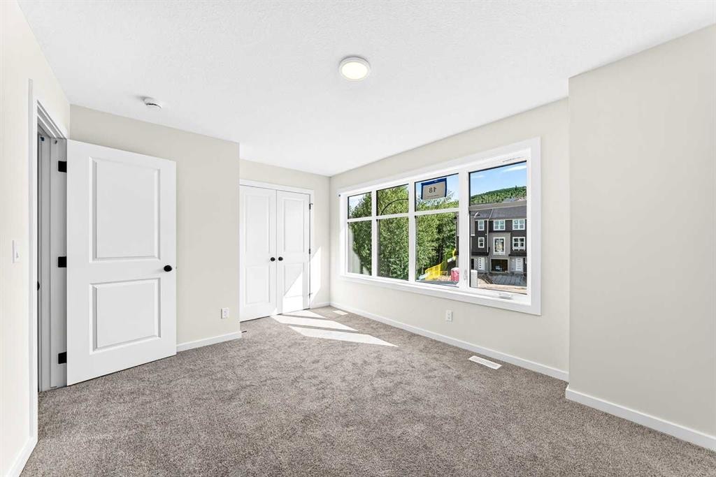 135 Mallard Heath Se, Calgary, AB - Indoor Photo Showing Other Room