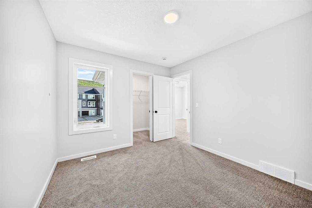135 Mallard Heath Se, Calgary, AB - Indoor Photo Showing Other Room