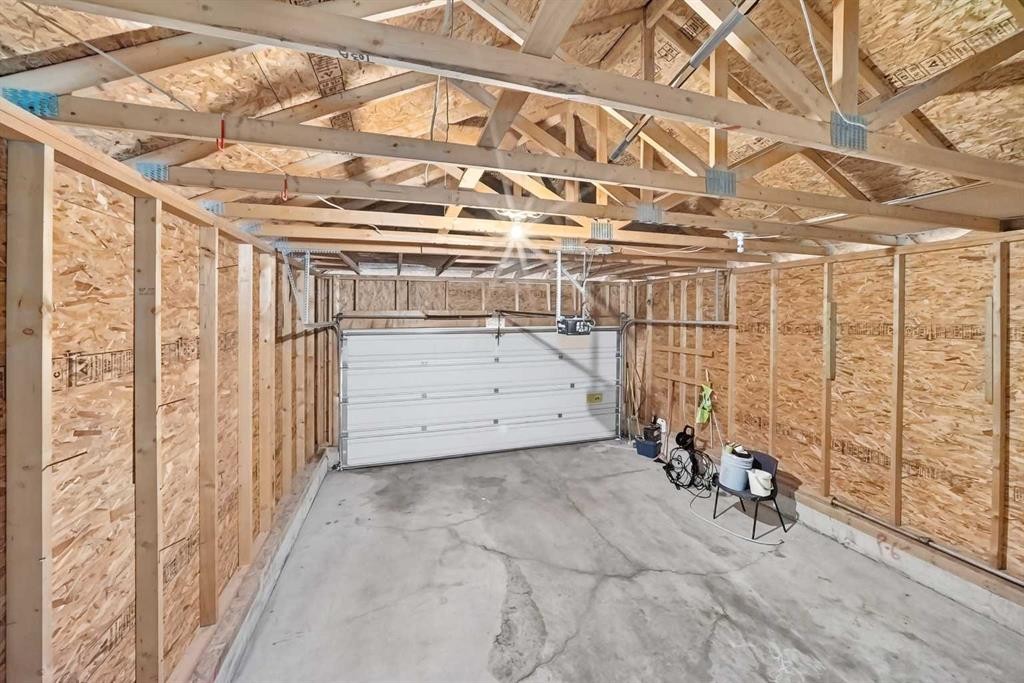 531 Stonegate Road Nw, Airdrie, AB - Indoor Photo Showing Garage
