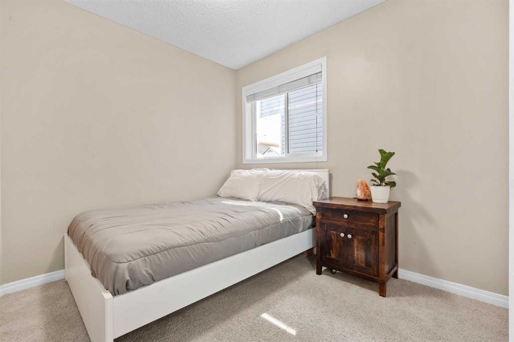 38 Auburn Bay Gardens Se, Calgary, AB - Indoor Photo Showing Bedroom