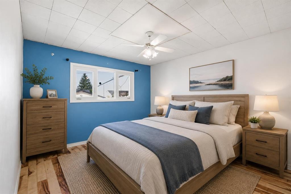 7807 Olympia Bay Se, Calgary, AB - Indoor Photo Showing Bedroom