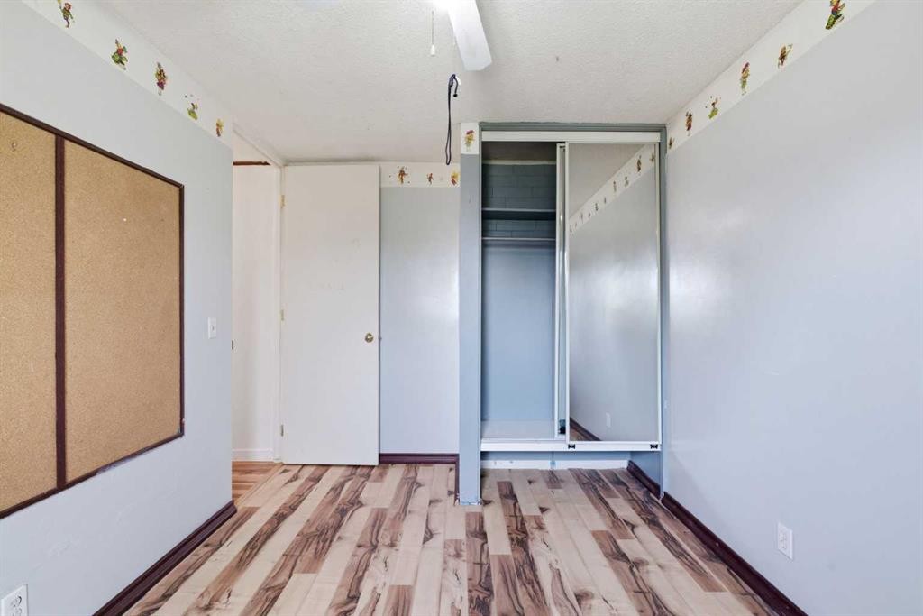 7807 Olympia Bay Se, Calgary, AB - Indoor Photo Showing Other Room