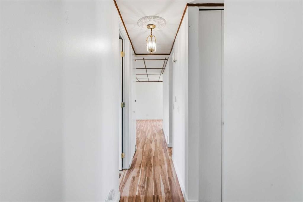 7807 Olympia Bay Se, Calgary, AB - Indoor Photo Showing Other Room