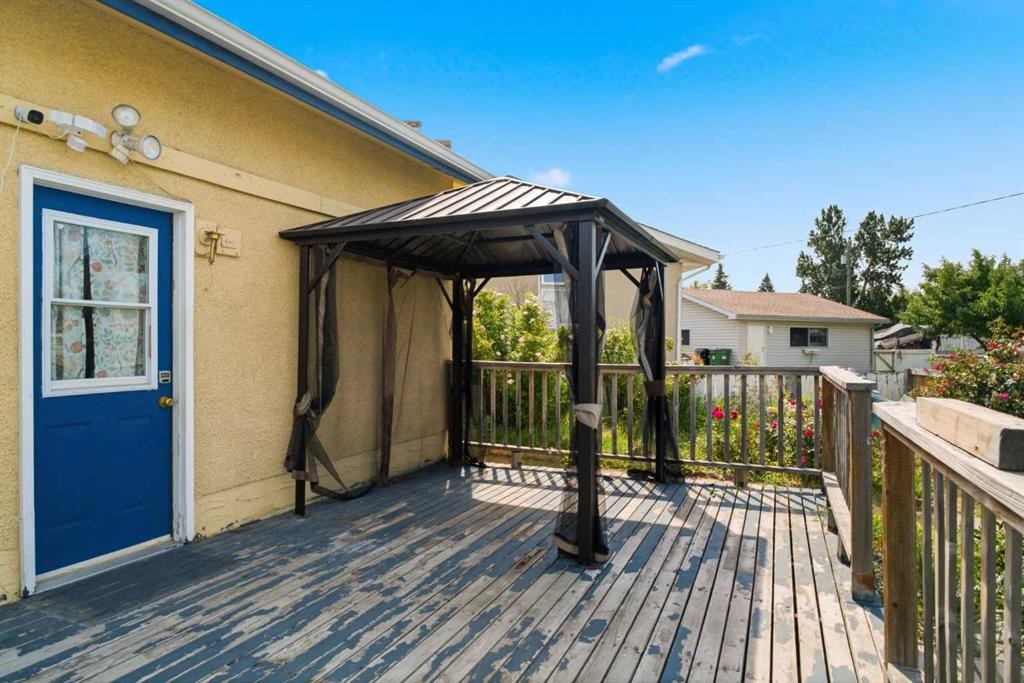 7807 Olympia Bay Se, Calgary, AB - Outdoor With Deck Patio Veranda With Exterior