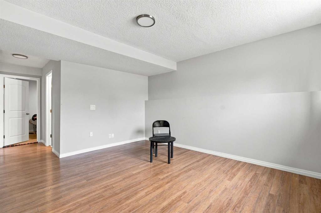 11 Martin Crossing Rise Ne, Calgary, AB - Indoor Photo Showing Other Room