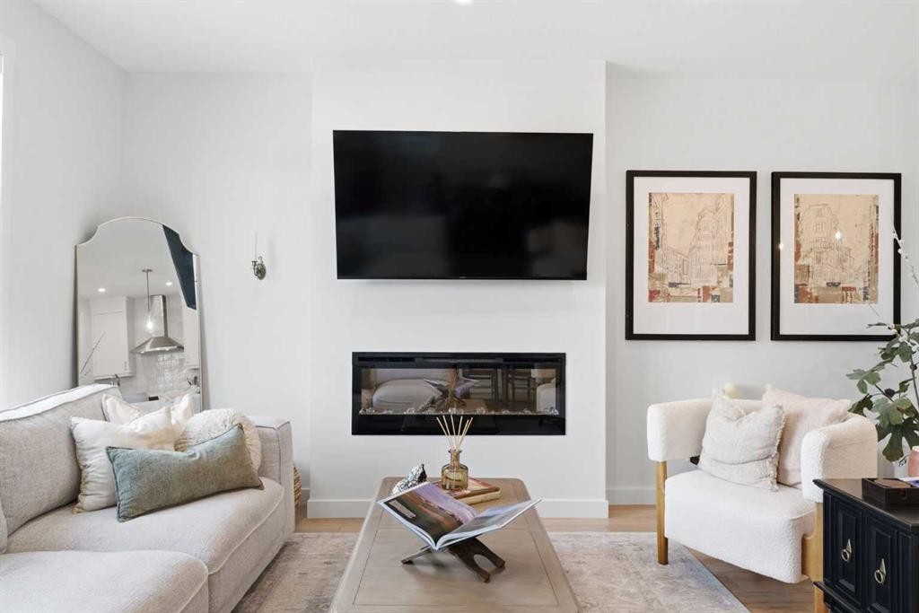 31 Seton Row Se, Calgary, AB - Indoor Photo Showing Living Room With Fireplace