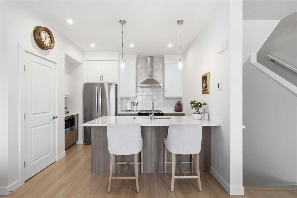 31 Seton Row Se, Calgary, AB - Indoor Photo Showing Kitchen With Stainless Steel Kitchen With Upgraded Kitchen