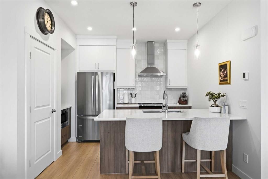 31 Seton Row Se, Calgary, AB - Indoor Photo Showing Kitchen With Stainless Steel Kitchen With Upgraded Kitchen