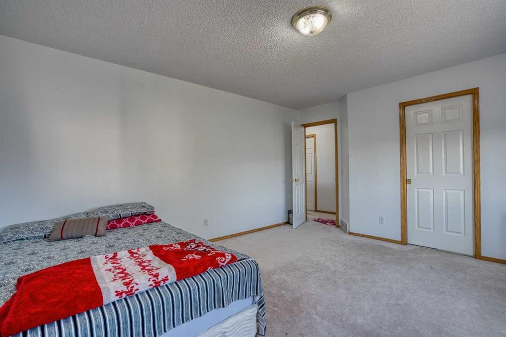 28 Coral Springs Close Ne, Calgary, AB - Indoor Photo Showing Bedroom