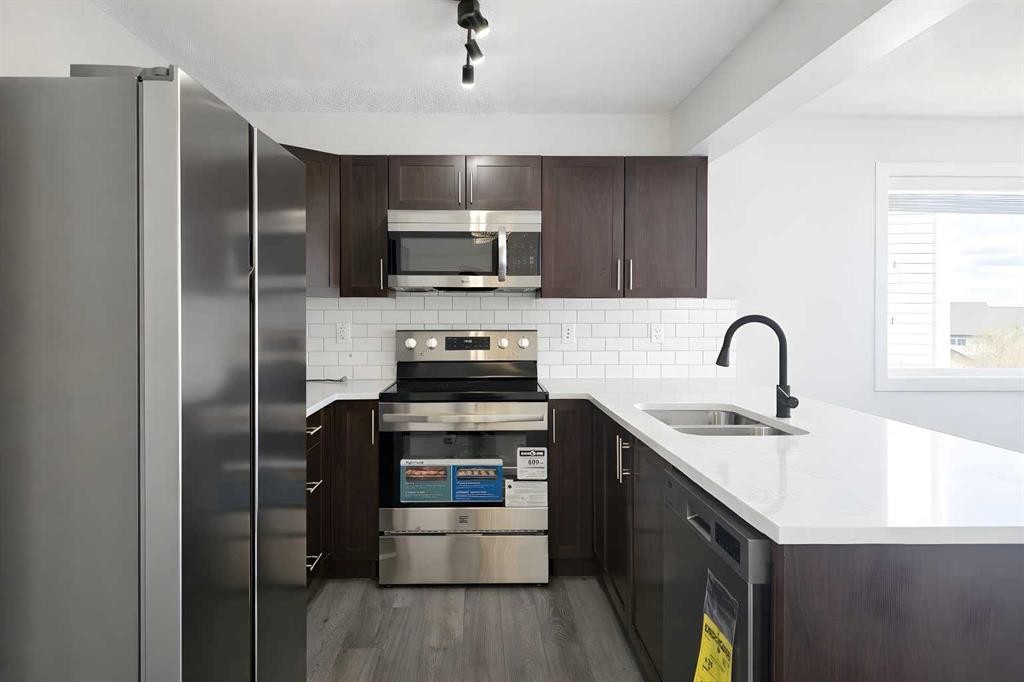 137 Pantego Lane Nw, Calgary, AB - Indoor Photo Showing Kitchen With Stainless Steel Kitchen With Double Sink With Upgraded Kitchen