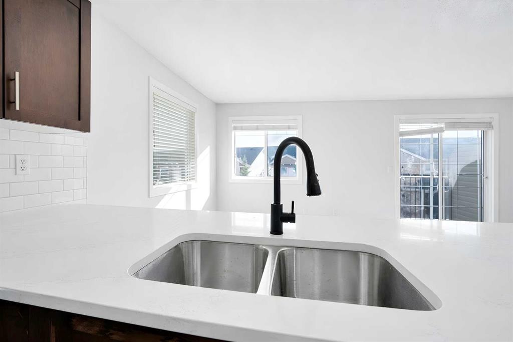 137 Pantego Lane Nw, Calgary, AB - Indoor Photo Showing Kitchen With Double Sink