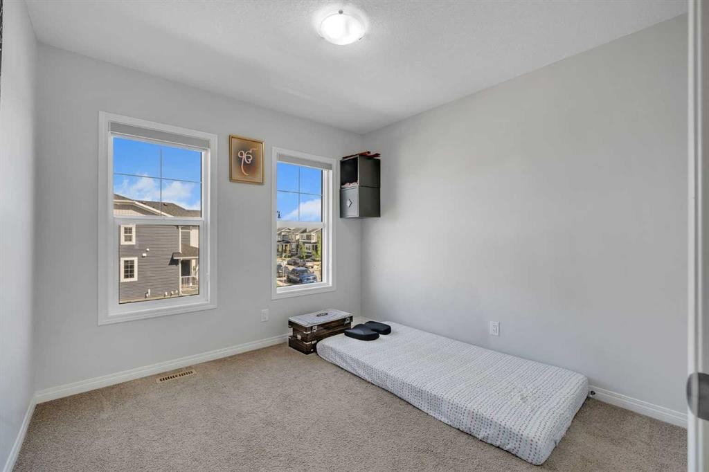 143 Dawson Harbour Hill, Chestermere, AB - Indoor Photo Showing Other Room