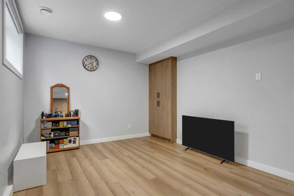 143 Dawson Harbour Hill, Chestermere, AB - Indoor Photo Showing Other Room