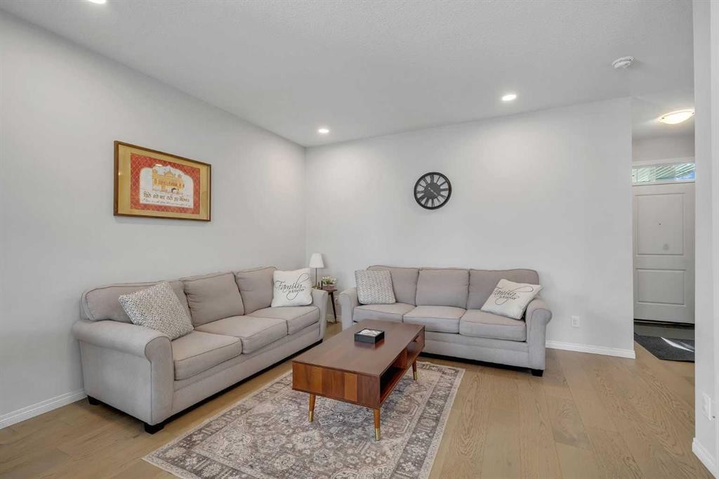 143 Dawson Harbour Hill, Chestermere, AB - Indoor Photo Showing Living Room